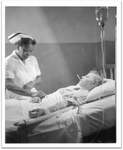 Patient Receiving Care from Nurse