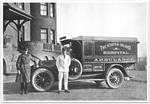 Motorized Ambulance and Staff